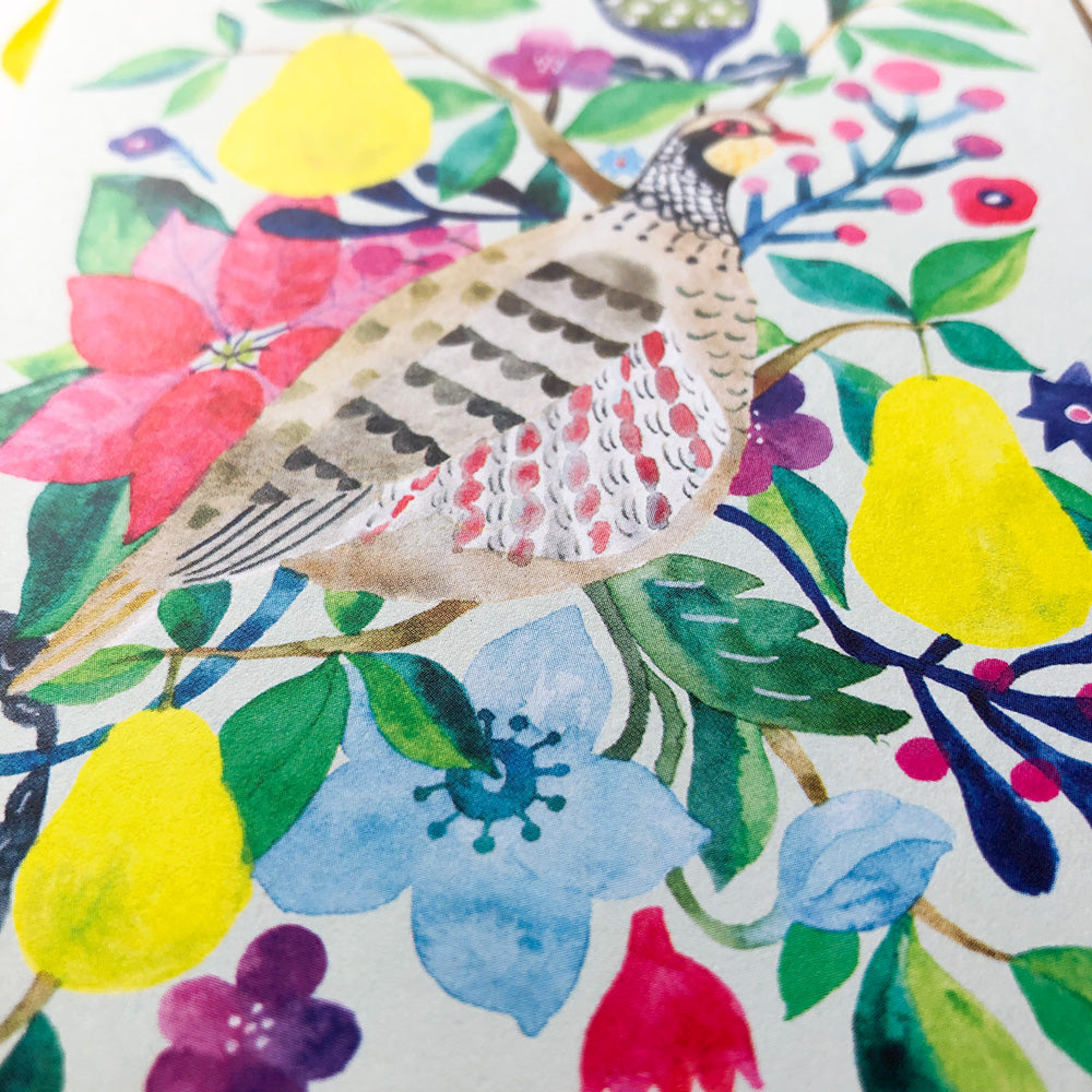 Watercolor illustration of a partridge surrounded by vibrant flowers, pears, and foliage, featuring a colorful mix of red poinsettias, yellow pears, blue blossoms, and green leaves on a white background, perfect for a festive holiday greeting card