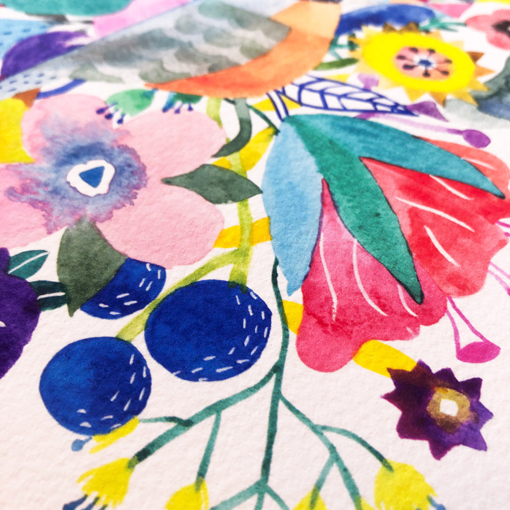 Vibrant watercolor floral print featuring colorful blooms, leaves, and berries in various shapes and sizes. Close-up view showcasing the artwork's intricate details and rich, saturated hues on white paper.