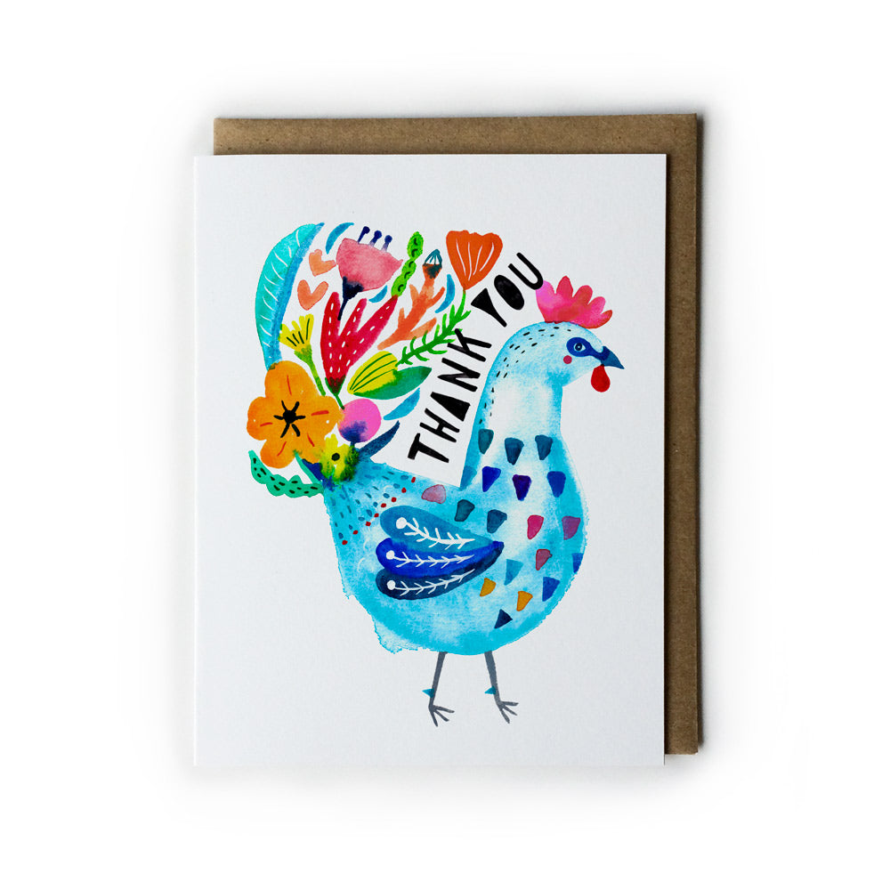 Colorful watercolor thank you card featuring a vibrant blue rooster with floral tail feathers and "Thank You" text, accompanied by a kraft paper envelope