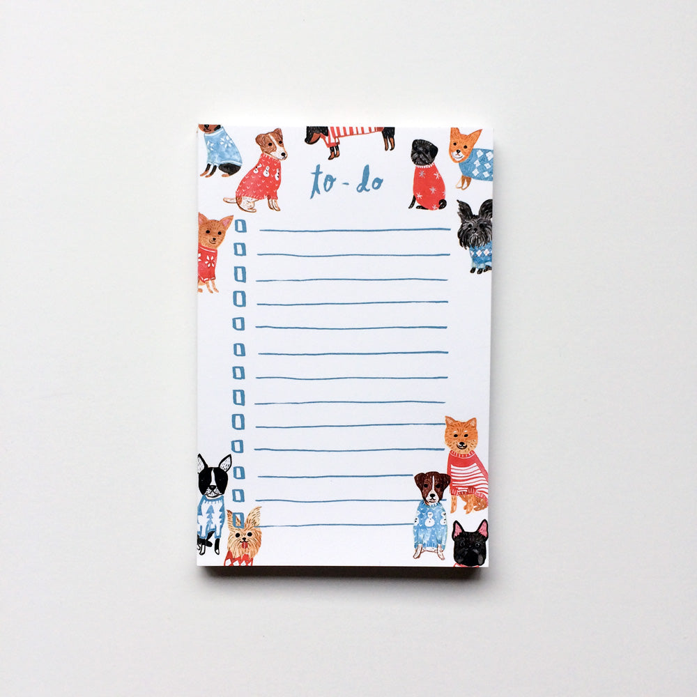 Colorful to-do list notepad featuring watercolor illustrations of small dogs wearing sweaters, with lined spaces for tasks and checkboxes, perfect for dog lovers and organizing daily activities