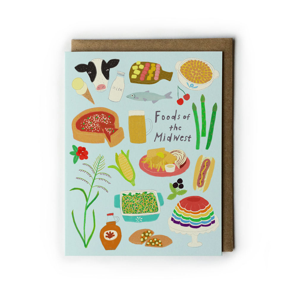 Colorful illustration of Midwest foods on a light blue notecard, featuring iconic dishes and ingredients like corn, hot dog, fish, casserole, and Jell-O salad, with brown kraft envelope