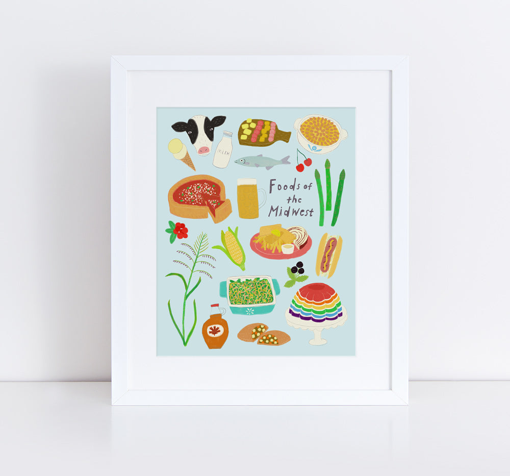 Colorful giclee art print showcasing iconic Midwest foods, including corn, cheese, hot dish, and more, in a whimsical illustrated style, framed in white against a light background