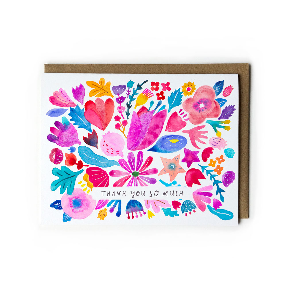 Vibrant watercolor thank you card with colorful floral design featuring pink, red, blue, and yellow flowers, hearts, and leaves. Text reads "Thank you so much" in the center. Paired with kraft paper envelope.