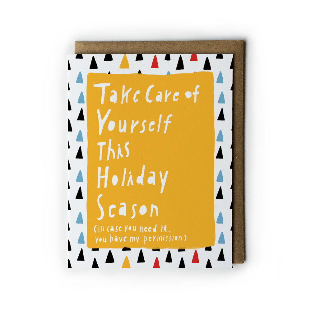 Holiday self-care card with yellow background and white text saying "Take Care of Yourself This Holiday Season", surrounded by colorful triangles pattern, with kraft paper envelope