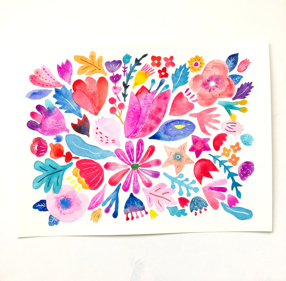 Vibrant watercolor floral arrangement featuring pink, red, blue, and yellow flowers with heart shapes, leaves, and abstract elements on white card stock, perfect for a cheerful thank you greeting