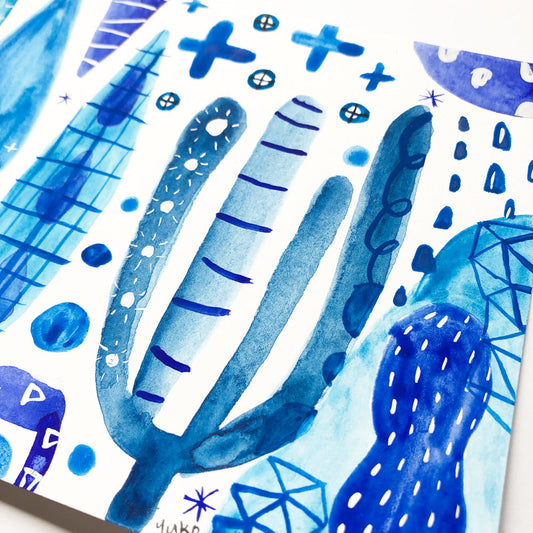 Original abstract watercolor painting featuring various shades of blue with geometric and organic shapes, including curves, crosses, and dots, on white paper, creating a vibrant and whimsical composition