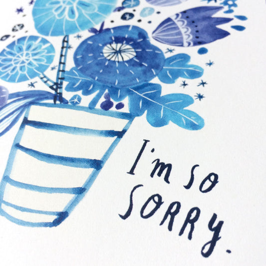 Watercolor sympathy card featuring blue floral bouquet in striped vase with handwritten "I'm so sorry" message, offering condolences and comfort