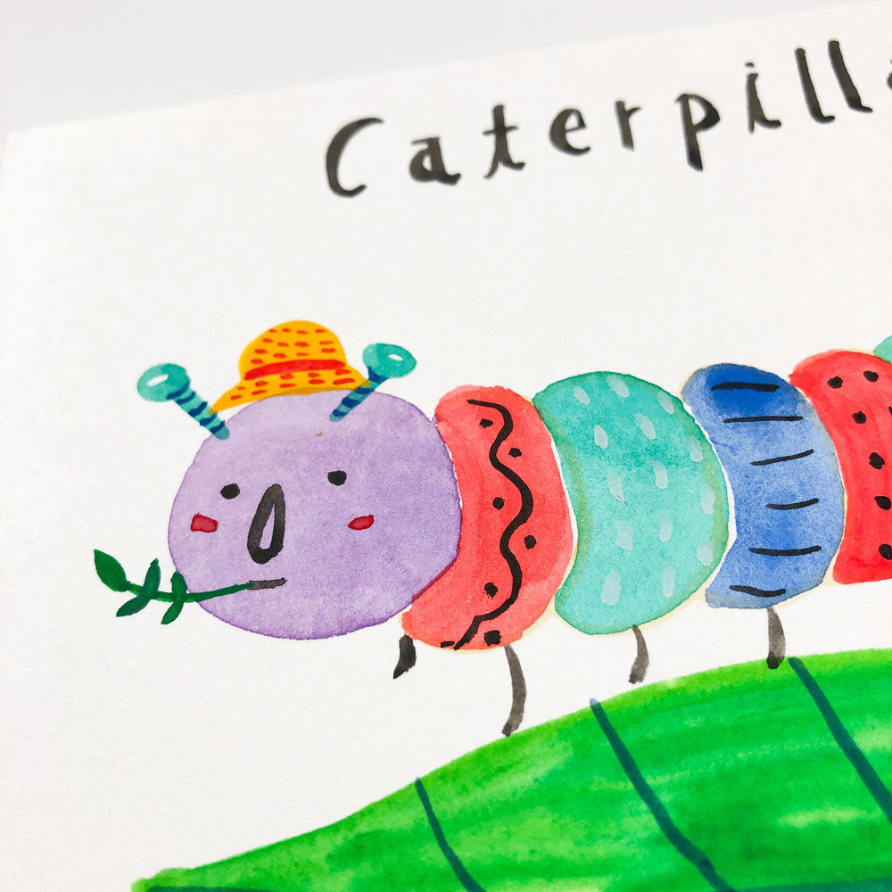 Whimsical watercolor painting of a colorful caterpillar with a purple head, orange hat, and body segments in pink, teal, blue, and red, standing on a green leaf. The word "Caterpillar" is handwritten above the illustration.