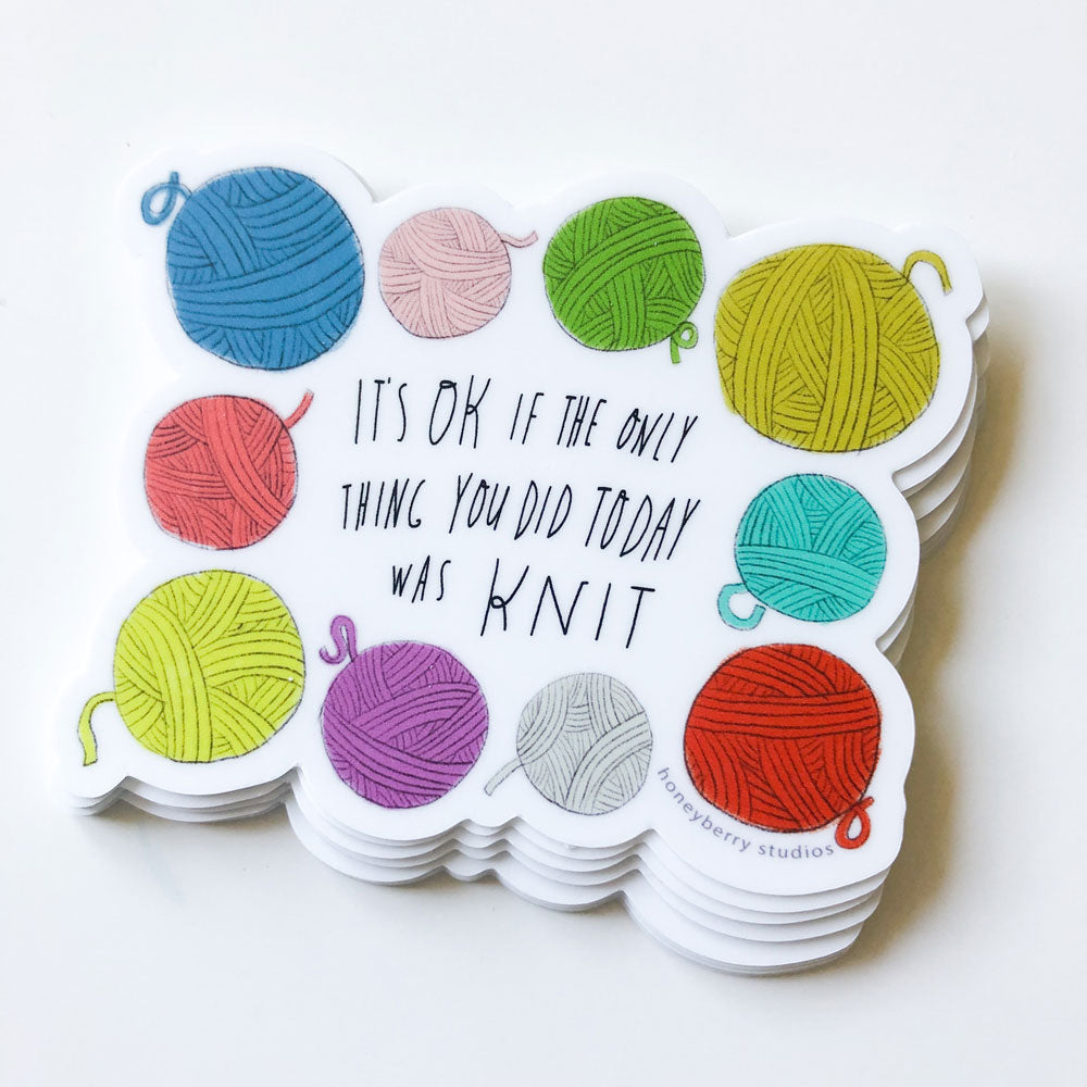 Colorful vinyl sticker featuring yarn balls in various hues surrounding text "It's OK if the only thing you did today was knit", perfect for knitting enthusiasts