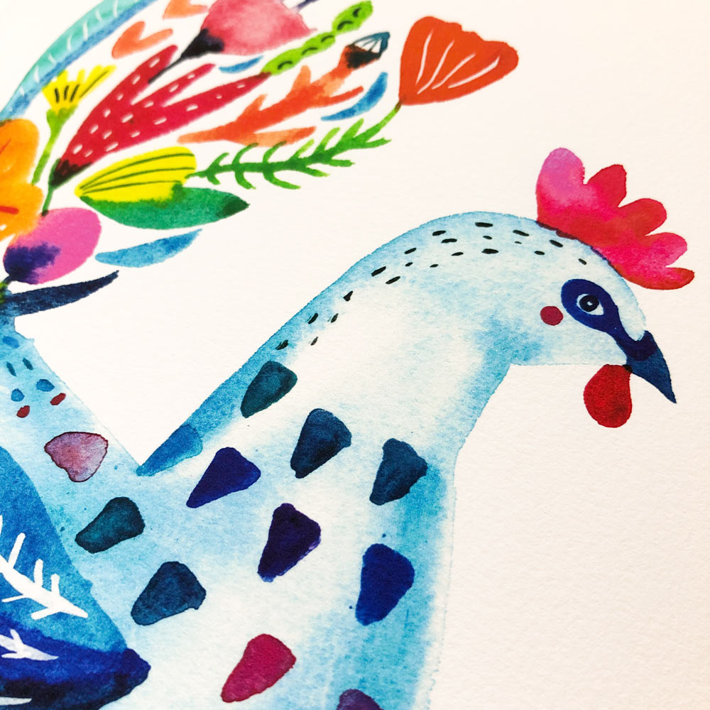 Colorful watercolor illustration of a whimsical blue rooster with vibrant floral patterns on its body and tail feathers, featuring a mix of bright colors and abstract shapes
