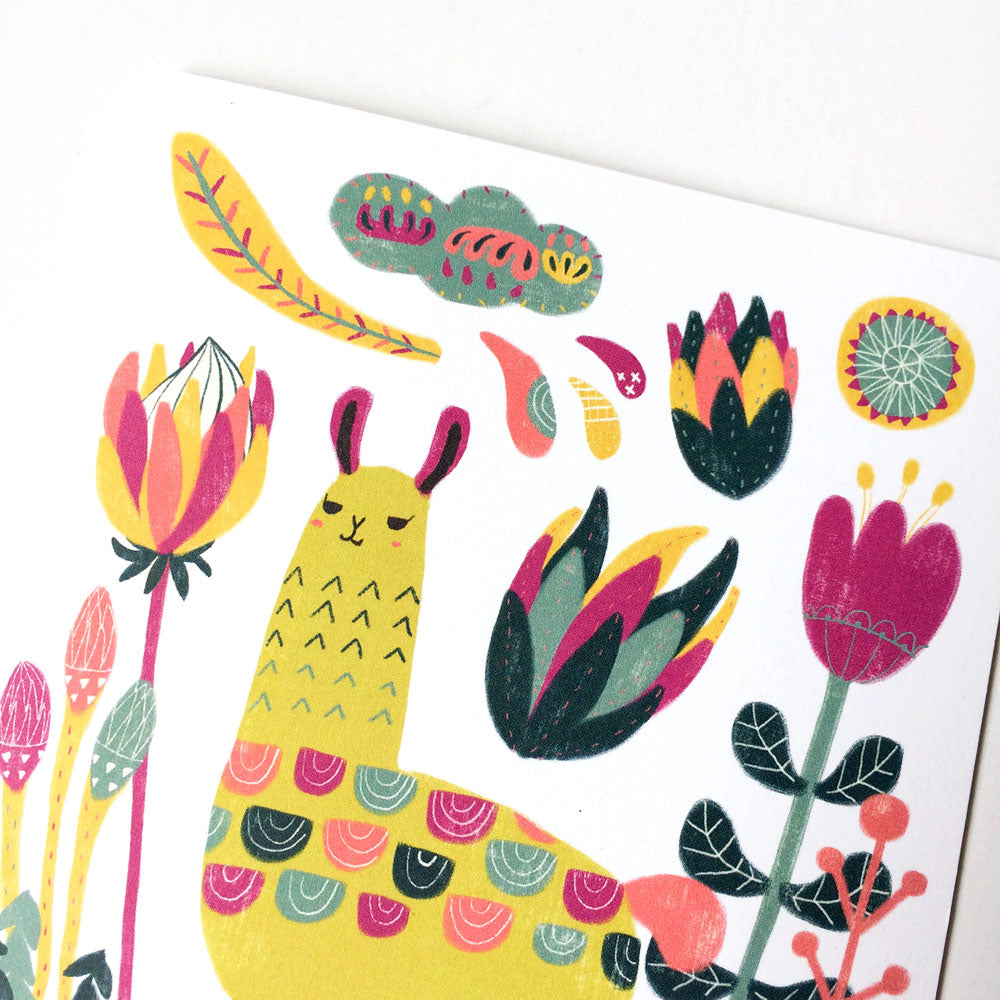 Colorful botanical card featuring a whimsical yellow llama surrounded by vibrant floral elements, including tulips, succulents, and stylized leaves in pink, green, and orange hues, creating a cheerful and playful design