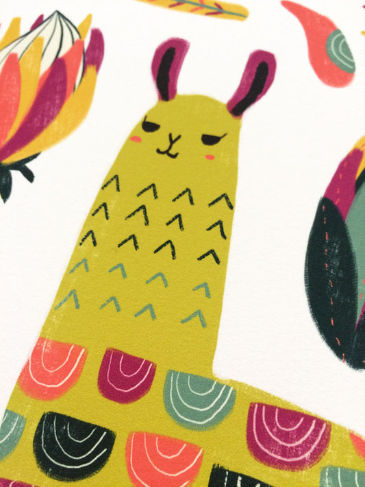 Colorful illustration of a stylized yellow llama with long ears and patterned body, surrounded by vibrant floral elements including a pink and yellow flower and abstract leaf shapes on a white background