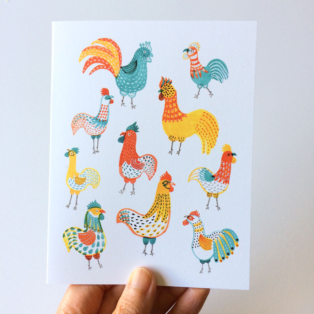 Colorful illustration of ten whimsical roosters and chickens in various patterns and poses on a white notecard, showcasing diverse and vibrant designs for the Rooster Friends Notecards product