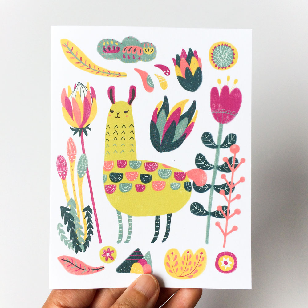 Colorful botanical card featuring a stylized yellow llama surrounded by vibrant flowers, leaves, and abstract shapes in a whimsical folk art style