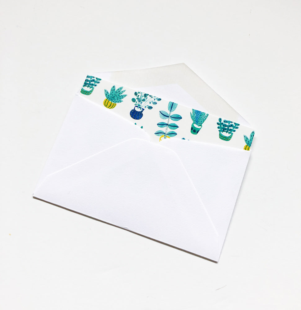White envelope with colorful succulent plant illustrations on the flap, featuring various cacti and potted plants in shades of blue and green, perfect for mini greetings or gift enclosures