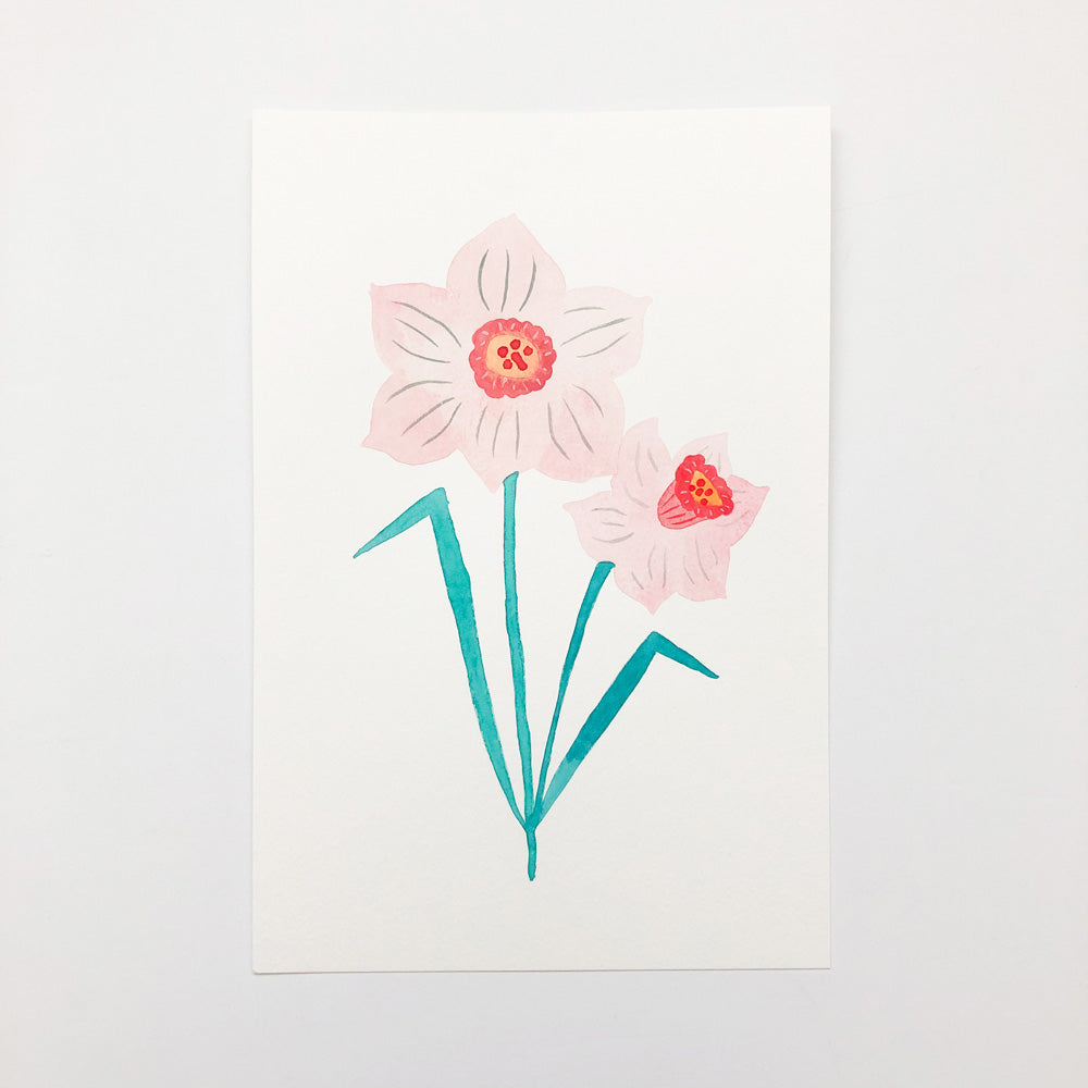 Original watercolor and gouache painting of two daffodils, one large and one small, with pale pink petals and orange centers on teal stems against a white background, showcasing delicate botanical artwork on 9x6 inch paper
