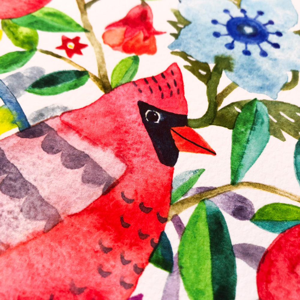 Vibrant watercolor painting of a red cardinal bird among colorful flowers and foliage, featuring blue and red blooms with intricate details on white background