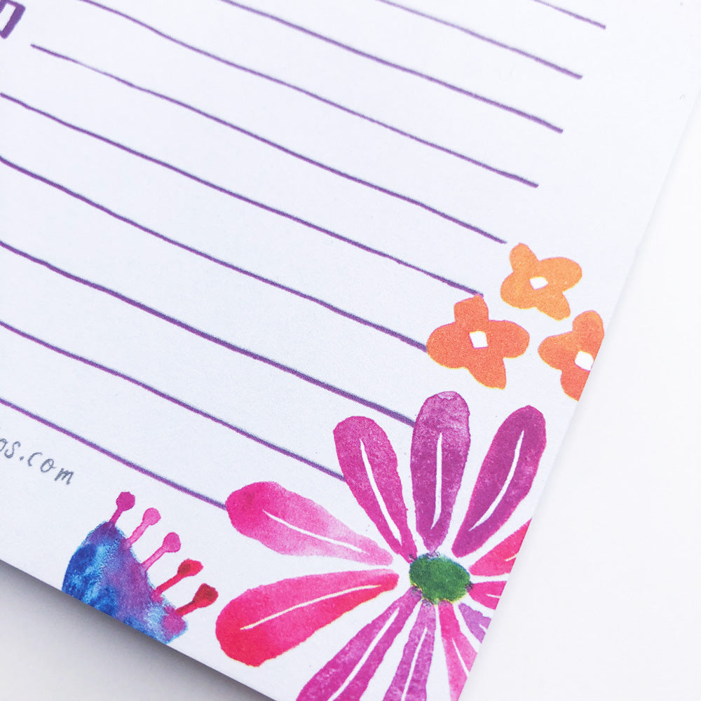 Colorful floral to-do list notepad featuring watercolor illustrations of pink and orange flowers, with purple lined paper for writing tasks, perfect for organizing and brightening your day