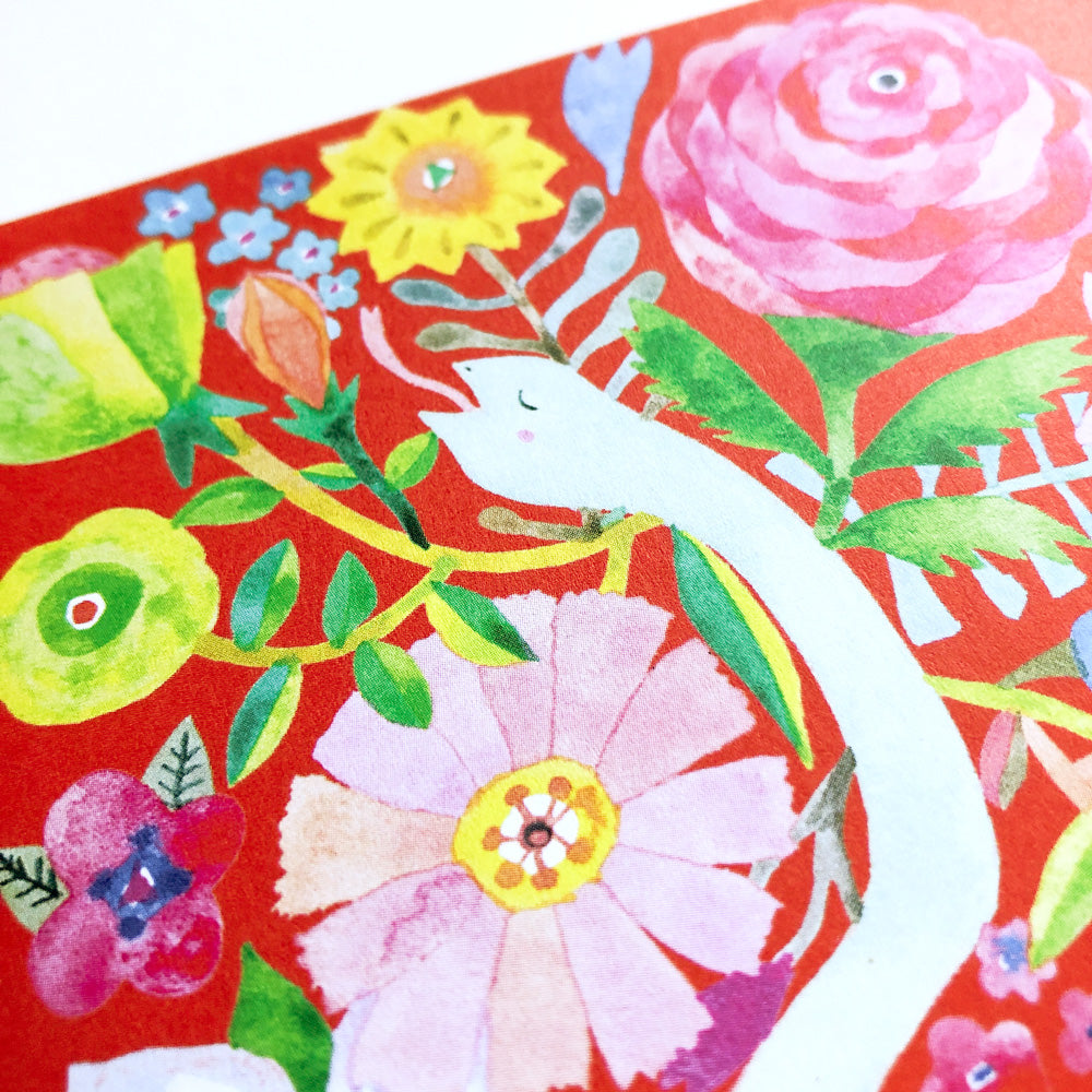 Vibrant watercolor illustration of a white snake surrounded by colorful flowers on a red background, featuring roses, sunflowers, and various floral elements for 2025 Year of the Snake Holiday Greeting Card