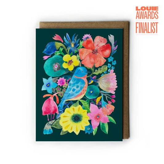 Colorful greeting card with a bluebird and flowers on a dark green background, Louie Awards Finalist badge on the top right corner.