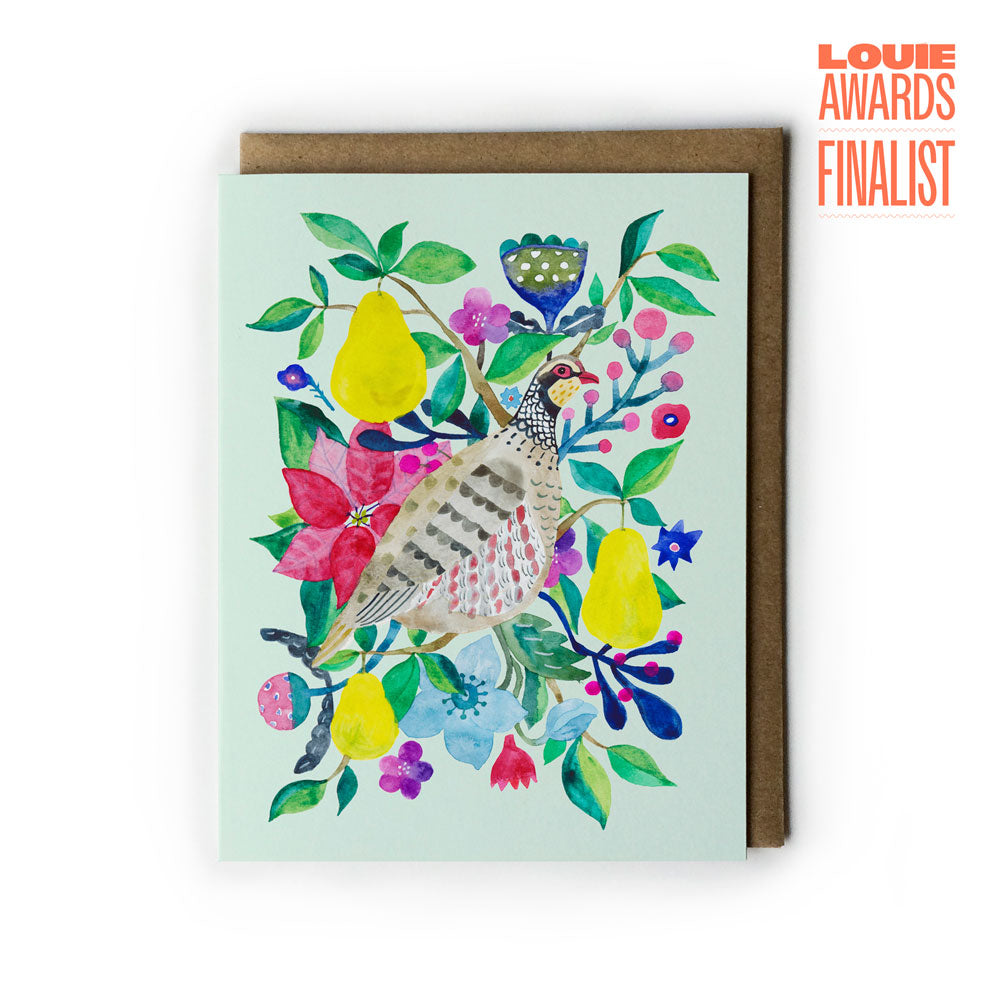 Greeting card with a partridge and pear  floral design, Louie Awards Finalist badge on the side.