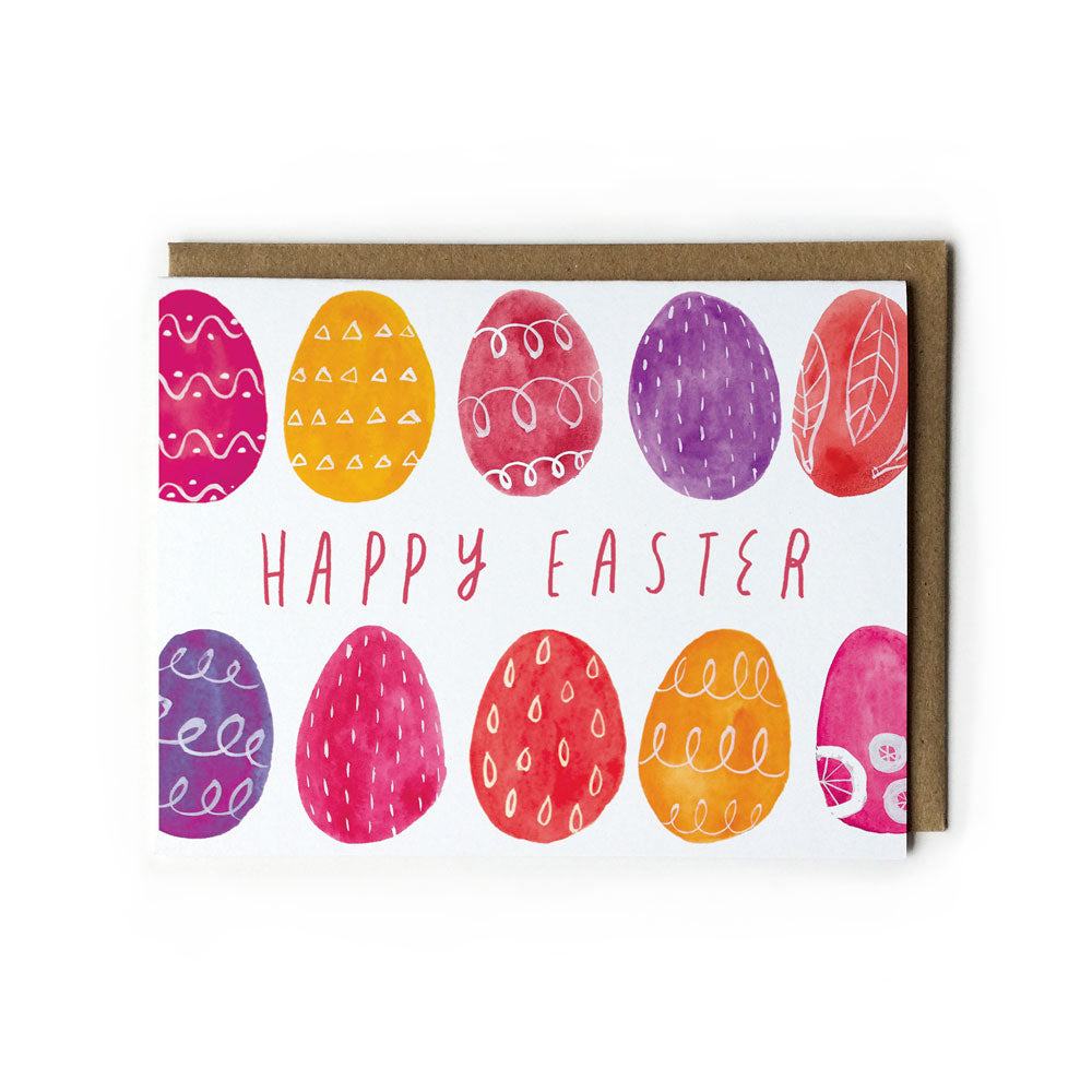 Colorful watercolor Easter eggs greeting card with "Happy Easter" text, featuring vibrant pink, purple, orange, and red eggs decorated with various patterns, displayed on white background with kraft envelope