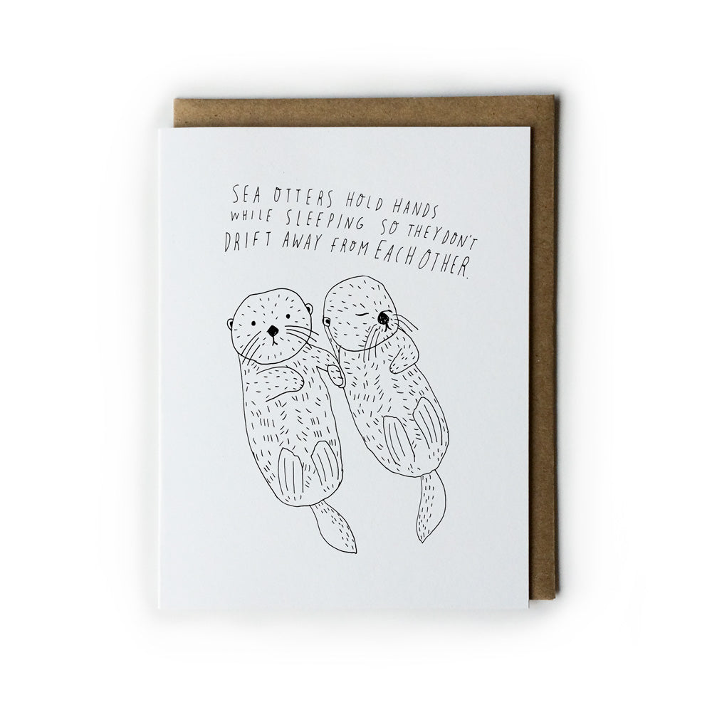 Sea Otters Holding Hands Greeting Card