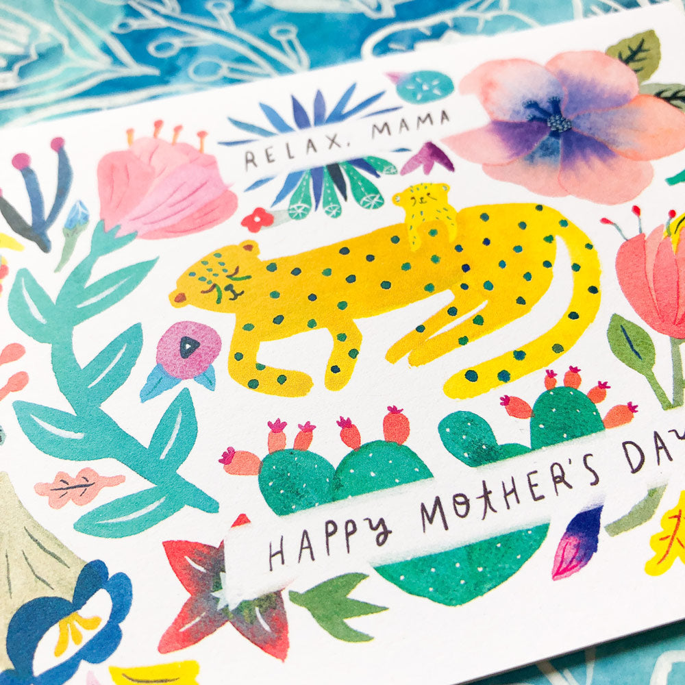 Colorful Mother's Day card featuring watercolor illustration of cheetah with floral elements, cactus, and 'Relax Mama' and 'Happy Mother's Day' text on white background