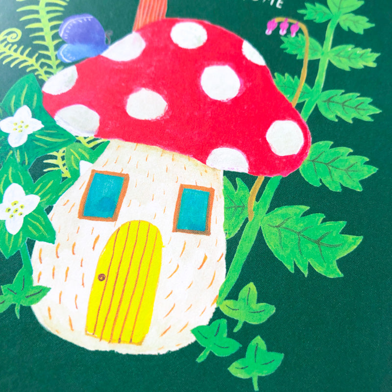 Whimsical illustration of a mushroom house with red polka-dot cap, white stem, yellow door, and blue windows, surrounded by green foliage and flowers on a dark green background